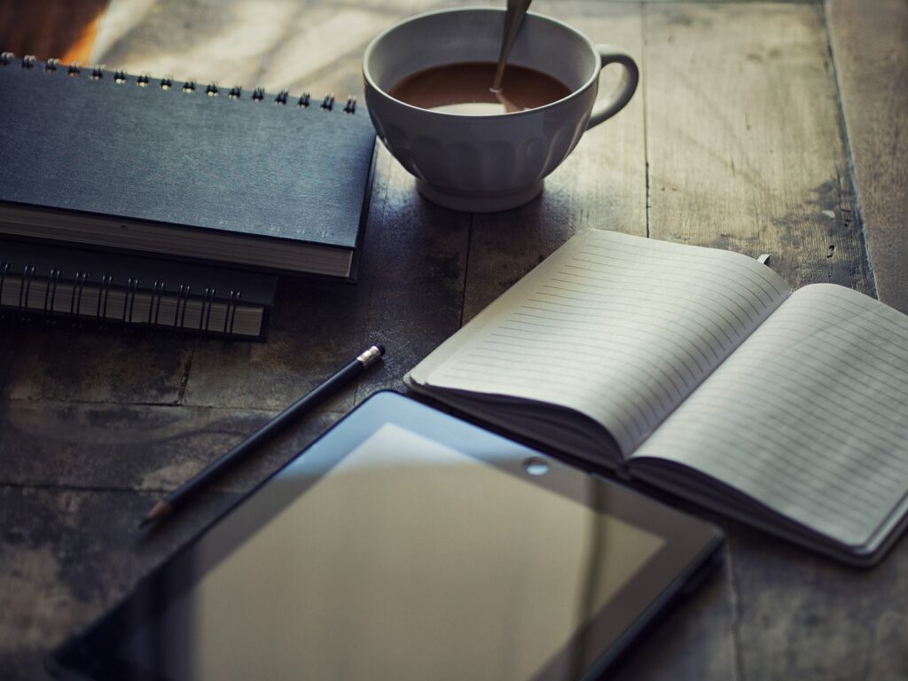 resume writing career preparation desk with notebook and coffee