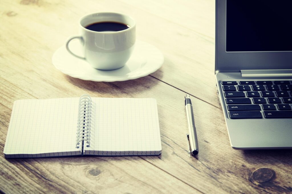 remote worker morning routine coffee laptop home office sunlight